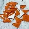 Orange triangle mosaic tiles at ClayMotion ballarat Victoria